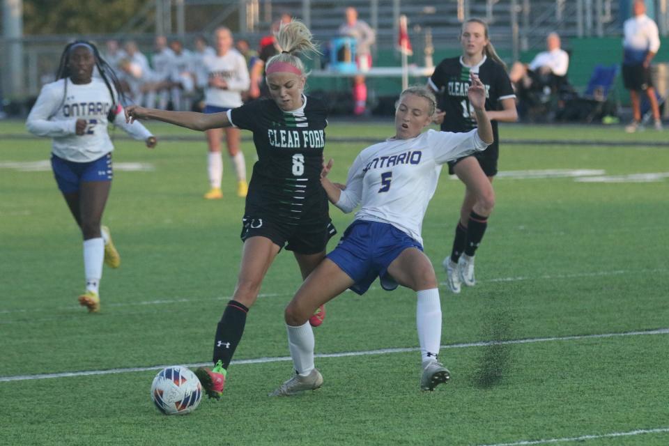 Clear Fork's Brinley Barnett and Ontario's Adi Turnbaugh battle for the ball during the Warriors' 3-0 win over the Colts on Tuesday night.