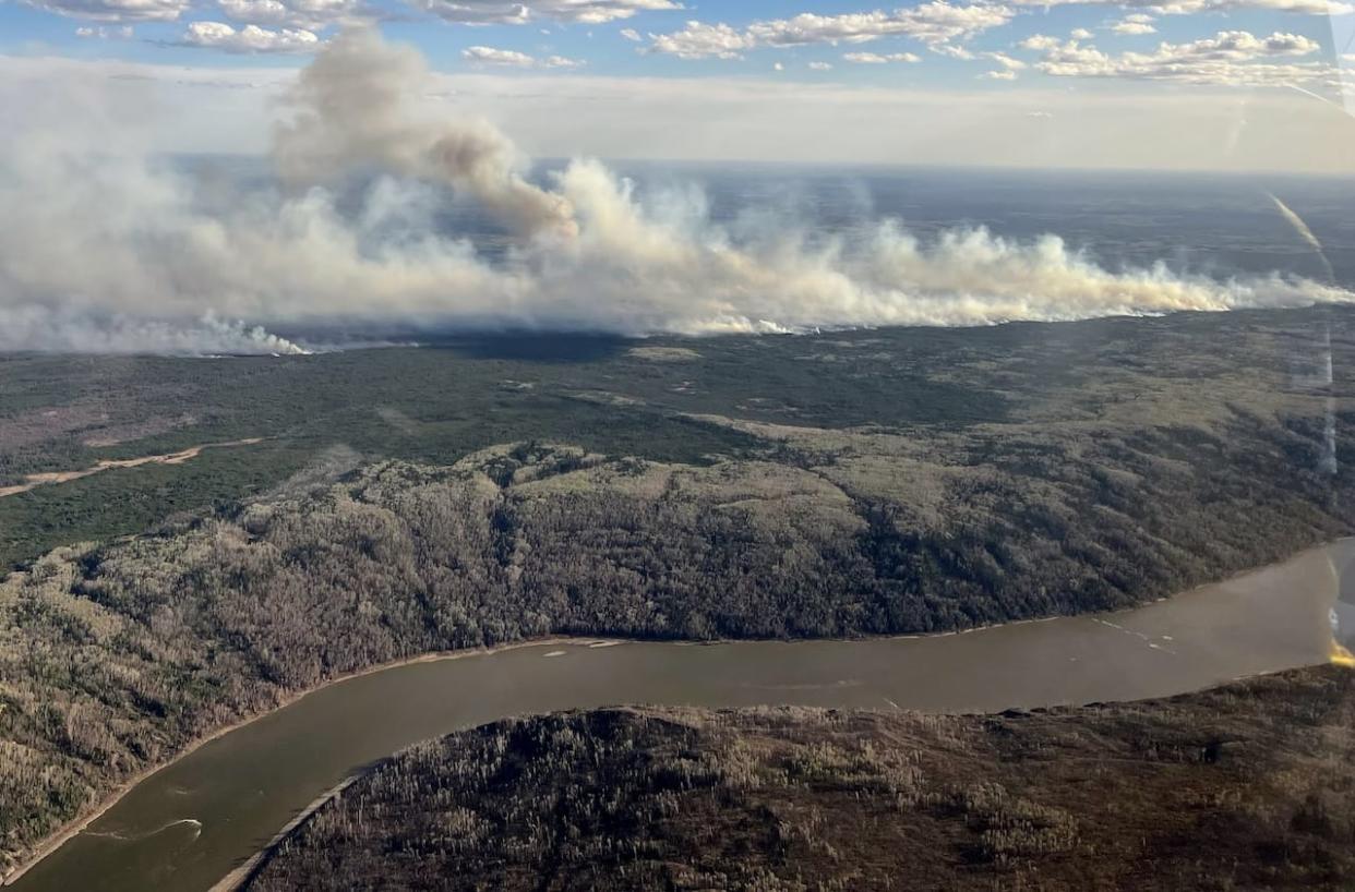 A wildfire southwest of Fort McMurray, pictured here on May 11, grew rapidly over the weekend.   (Alberta Wildfire - image credit)