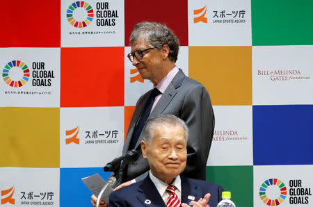 Bill Gates, co-chair of the Bill & Melinda Gates Foundation, and Yoshiro Mori, president of the Tokyo 2020 Organising Committee, attend a news conference as the foundation teams up with the Japan Sports Agency and Tokyo 2020 to promote the Sustainable Development Goals in conjunction with the Olympics, in Tokyo, Japan, November 9, 2018. REUTERS/Toru Hanai