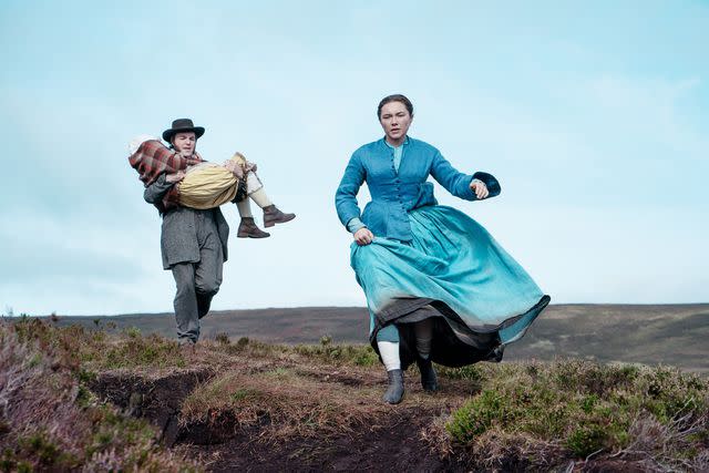 <p>Netflix/Courtesy Everett Collection</p> Kila Lord Cassidy, Tom Burke, and Florence Pugh in 'The Wonder'
