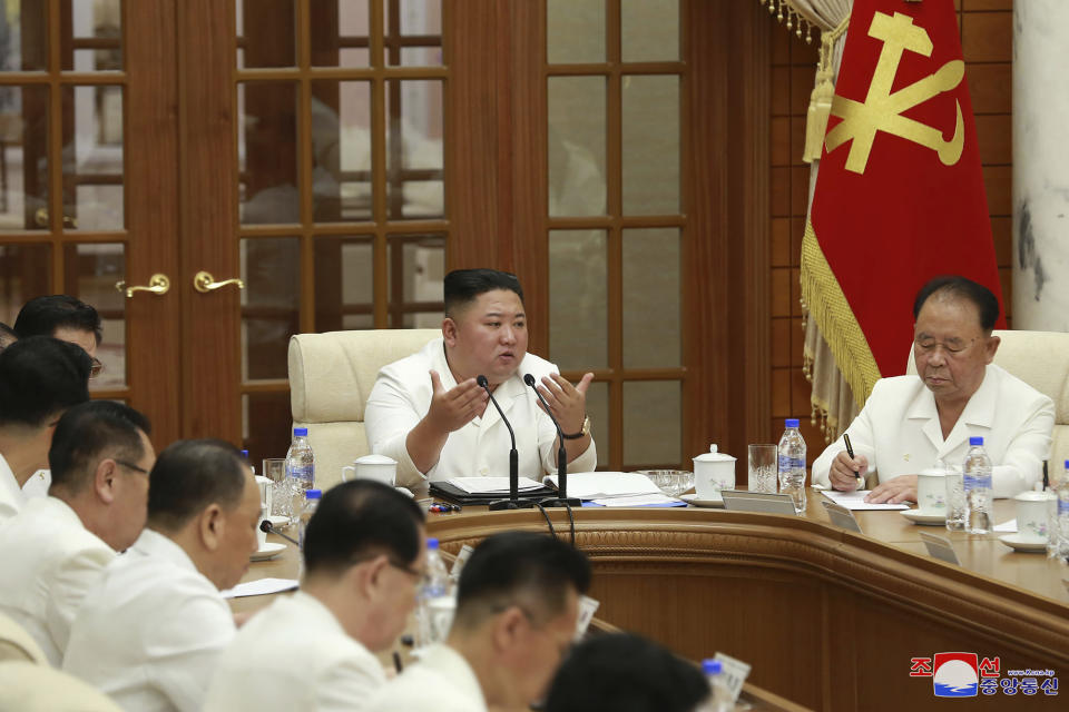 In this photo provided by the North Korean government, North Korean leader Kim Jong Un, center, attends an enlarged meeting of the Politburo of the ruling Workers’ Party in Pyongyang, North Korea, Tuesday, Aug. 25, 2020. Independent journalists were not given access to cover the event depicted in this image distributed by the North Korean government. The content of this image is as provided and cannot be independently verified. Korean language watermark on image as provided by source reads: "KCNA" which is the abbreviation for Korean Central News Agency. (Korean Central News Agency/Korea News Service via AP)