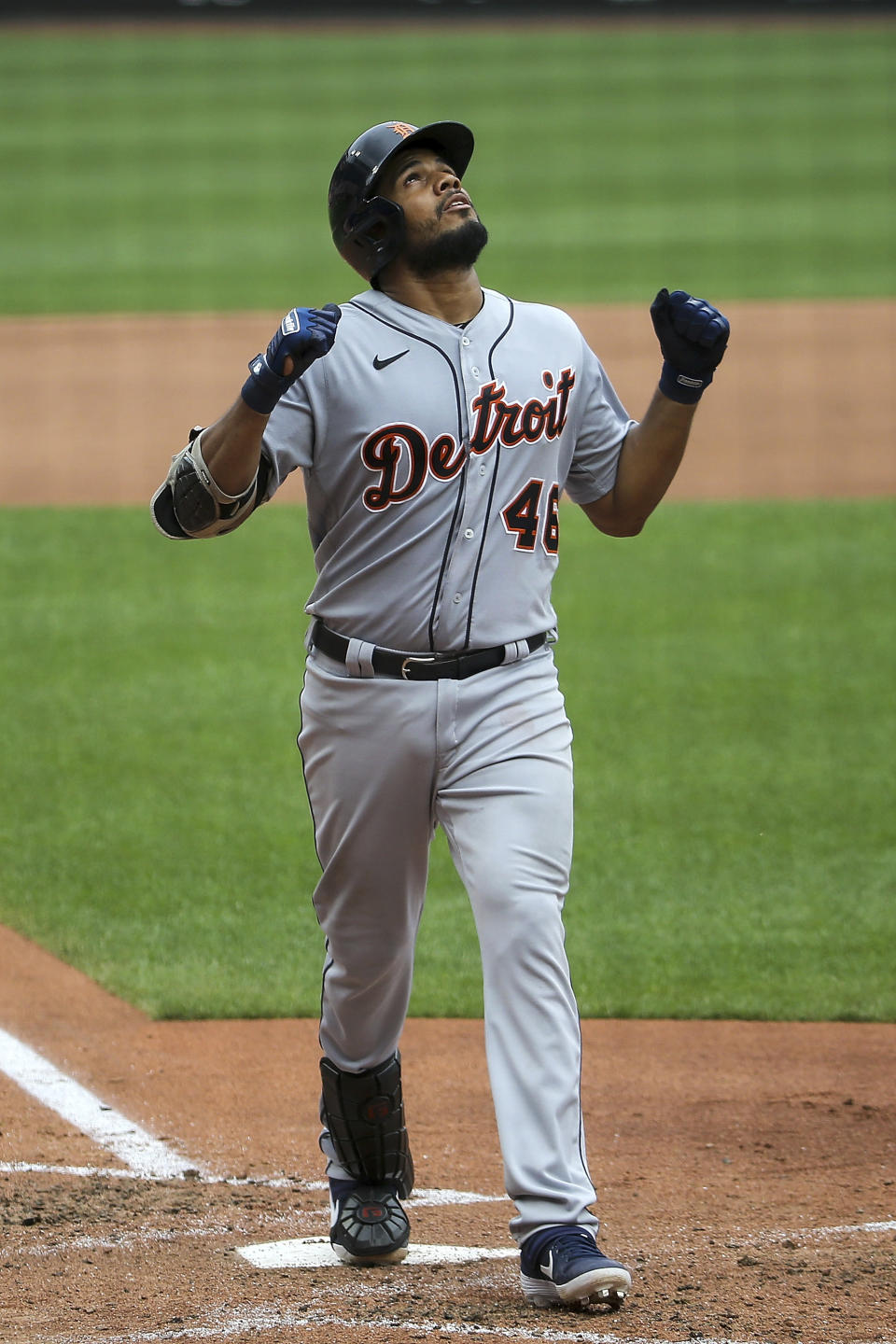Detroit Tigers' Jeimer Candelario gestures skyward after hitting a two-run home run during the fourth inning in the first game of a baseball doubleheader against the St. Louis Cardinals Thursday, Sept. 10, 2020, in St. Louis. (AP Photo/Scott Kane)