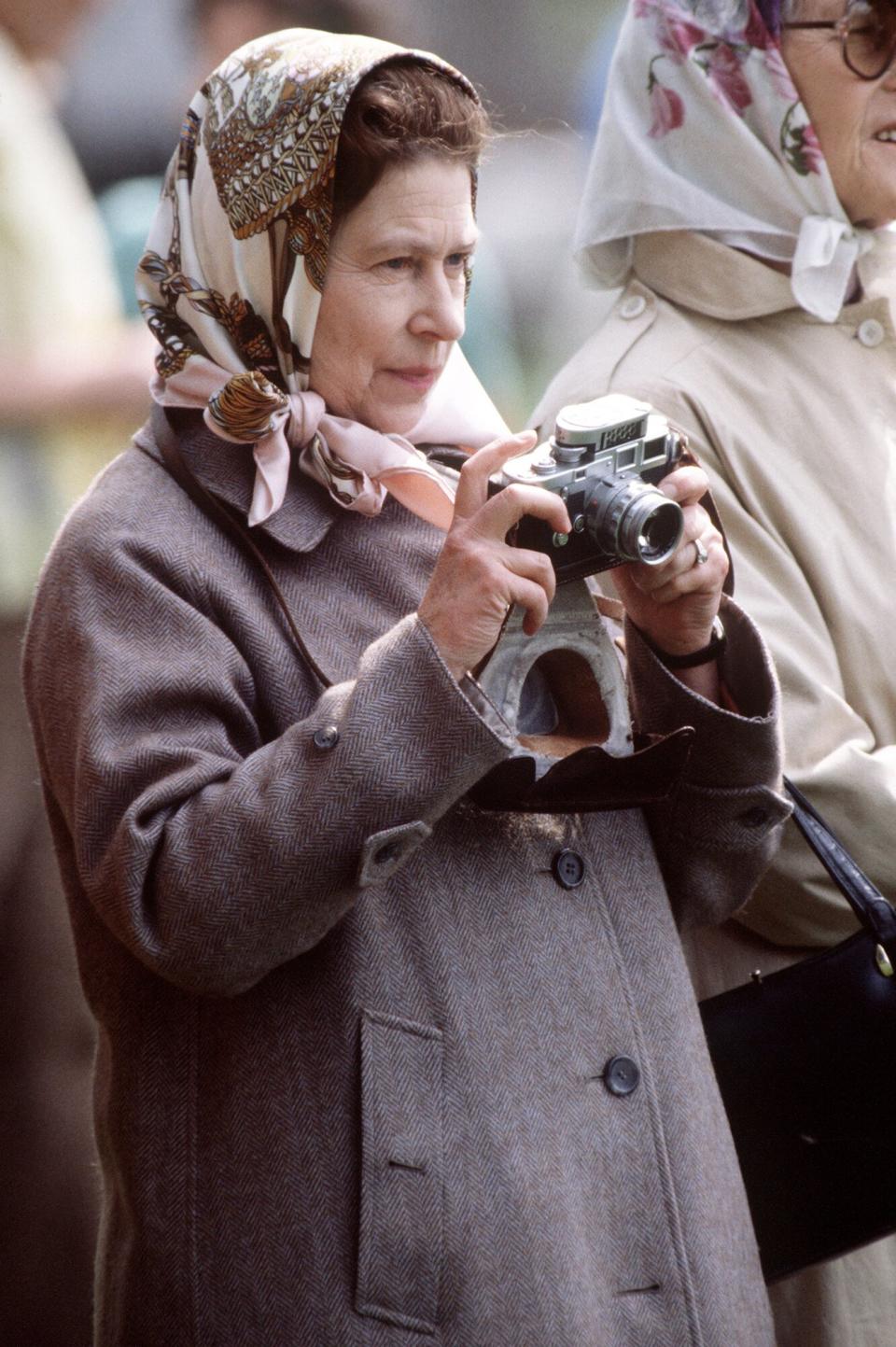 Queen At The Windsor Horse Show Taking Photographs With Her Camera