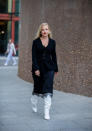 Kate Foley Osterweis is seen wearing black velvet blazer, midi skirt, white boots outside Ports 1961. [Photo: Getty]