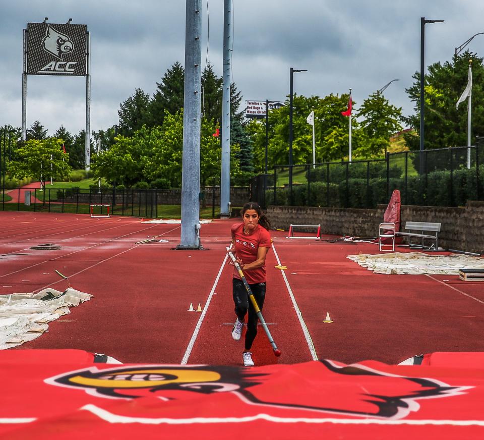 U of L's pole vaulter Aliyah Welter Gabriela Leon prepares to perform a pole vault jump during a practice at the Cardinal Track Stadium in Louisville, Ky on July 9, 2022.