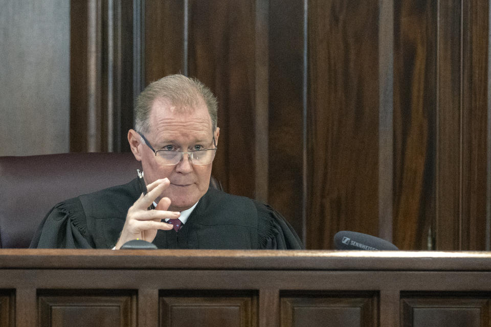 Superior Court Judge Timothy Walmsley responds to arguments during a motion hearing in the trial of Greg McMichael and his son, Travis McMichael, and a neighbor, William "Roddie" Bryan the Glynn County Courthouse, Thursday, Nov. 4, 2021, in Brunswick, Ga. The three are charged with the February 2021 slaying of 25-year-old Ahmaud Arbery. (AP Photo/Stephen B. Morton, Pool)
