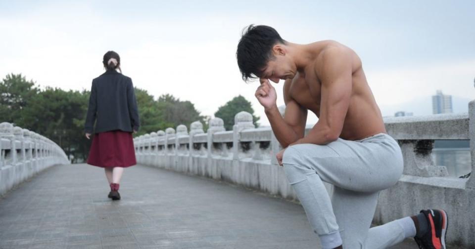 A man kneels “Thinker-style” after being rejected by a girl. (Photo courtesy of freephotomuscle.com)