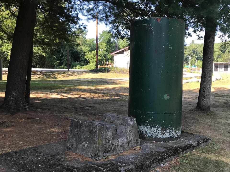 Cylindrical tanks filled with concrete served as bases for the ski lifts at the base of Diamond Hill.