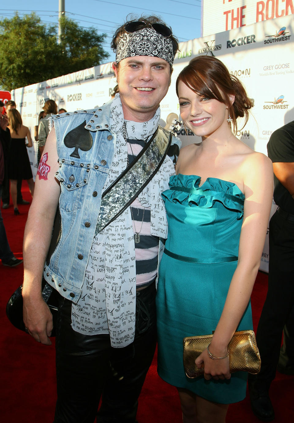 Rainn Wilson and actress Emma Stone arrive at the screening of ''The Rocker''&nbsp;in 2008.