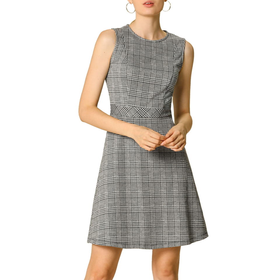 model wearing sleeveless mini gray plaid dress