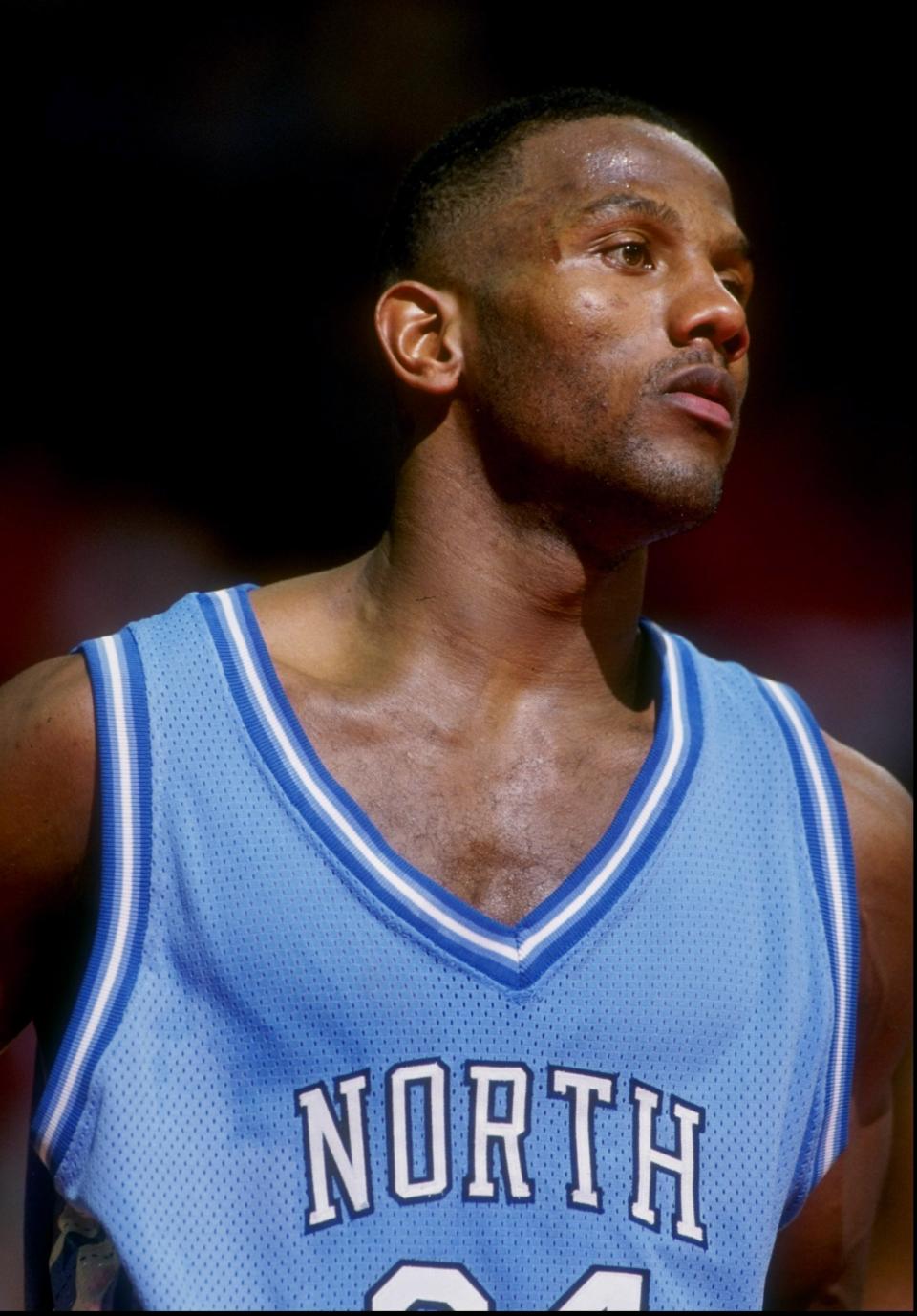 George Lynch of the North Carolina Tar Heels stands on the court during a game against the Maryland Terrapins at the Cole Field House in College Park, Maryland. Doug Pensinger /Allsport