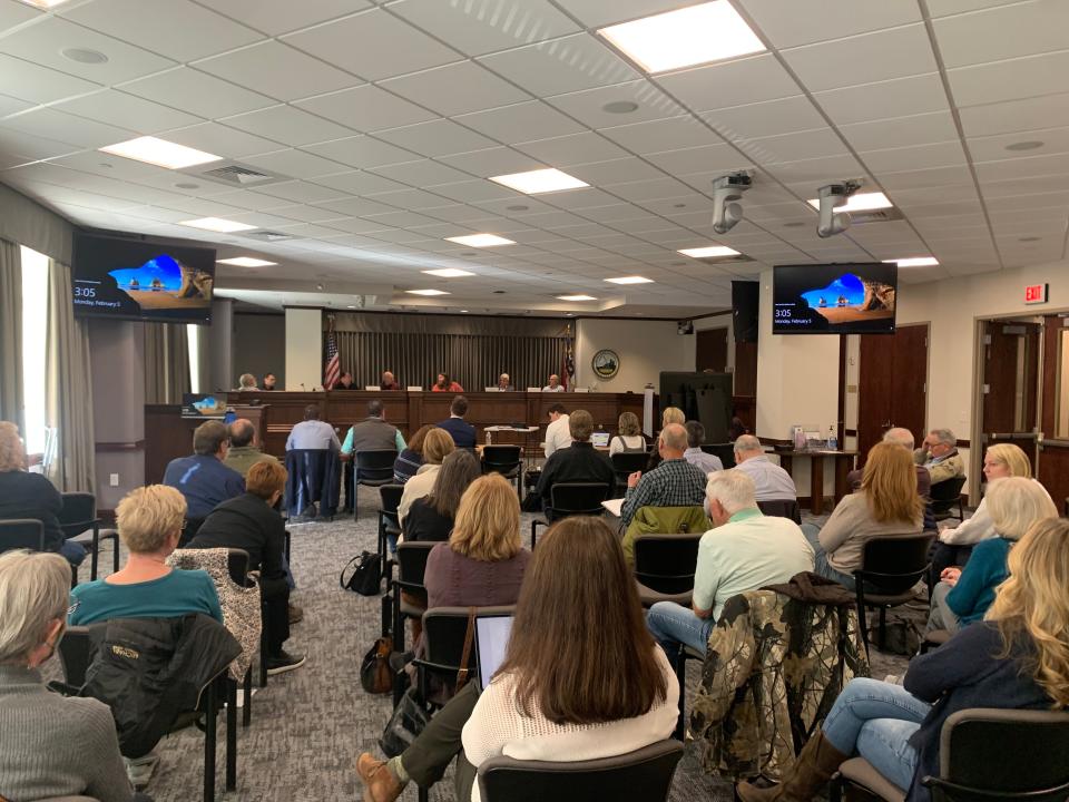 A crowd watches as the Buncombe County Board of Adjustment debates traffic studies regarding Wilderness Ridge on Feb. 5, 2024.