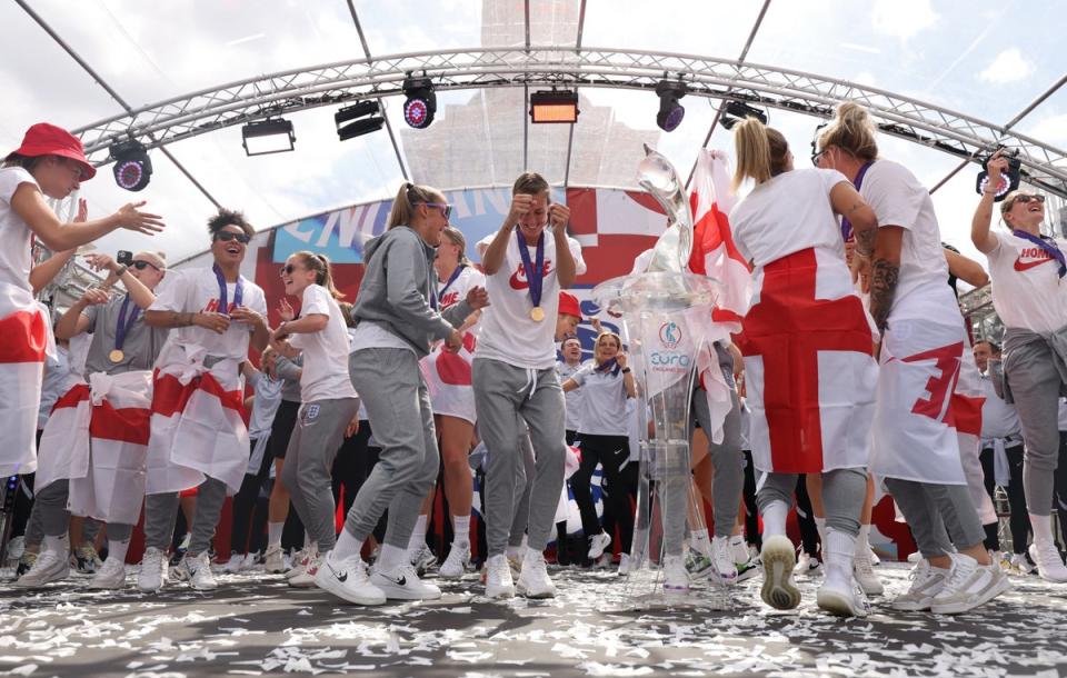 England players sing Sweet Caroline on stage during a fan celebration in Trafalgar Square, London, to commemorate England’s historic Euro 2022 triumph (James Manning/PA) (PA Wire)