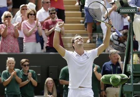 Richard Gasquet of France celebrates after winning his match against Nick Kyrgios of Australia at the Wimbledon Tennis Championships in London, July 6, 2015. REUTERS/Henry Browne