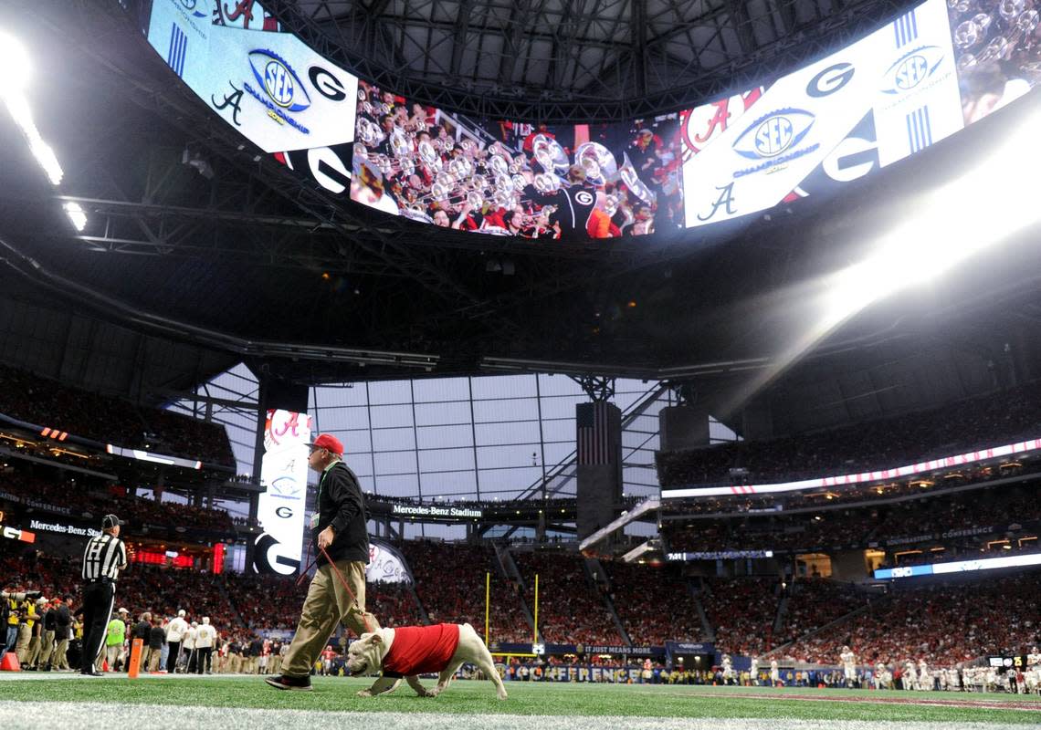 Georgia mascot Uga X walks across the field during a timeout in the Bulldogs’ 35-28 SEC Championship loss to Alabama in 2018.