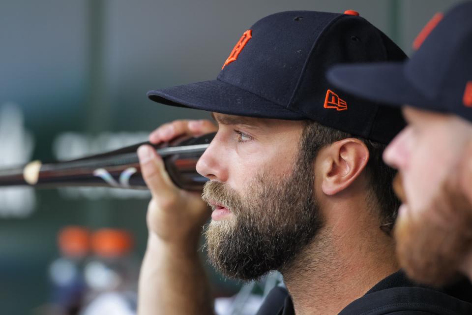 Tigers pitcher Daniel Norris holds a bat to his ear before the start of a game against the Twins of the Tigers' 6-5 loss in 10 innings on Monday, July 26, 2021, in Minneapolis.