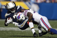 <p>Los Angeles Chargers running back Melvin Gordon, is tackled by Buffalo Bills defensive back Leonard Johnson during the first half of an NFL football game Sunday, Nov. 19, 2017, in Carson, Calif. (AP Photo/Jae C. Hong) </p>