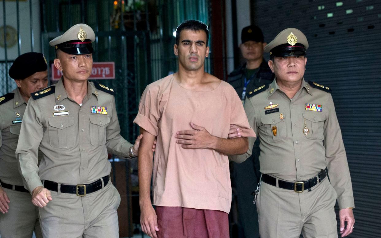 Bahraini Hakeem al-Araibi, centre, was shown last week in Thai custody - AP