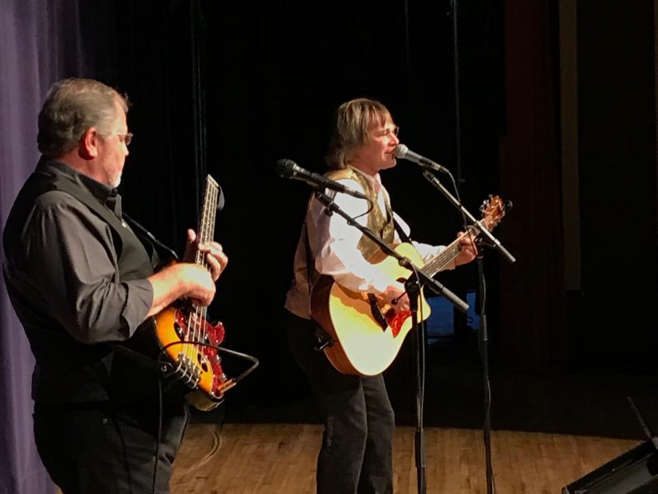 The side-stage view of Ted Vigil performing his John Denver tribute at Beaver Falls Middle School Auditorium.