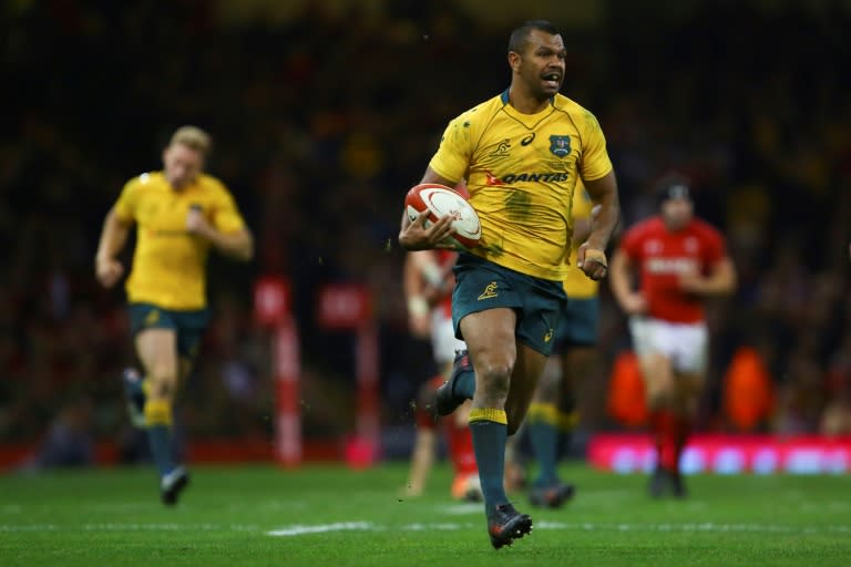 Australia's full-back Kurtley Beale runs in a try during their rugby union Test match against Wales, at the Principality Stadium in Cardiff, on November 11, 2017