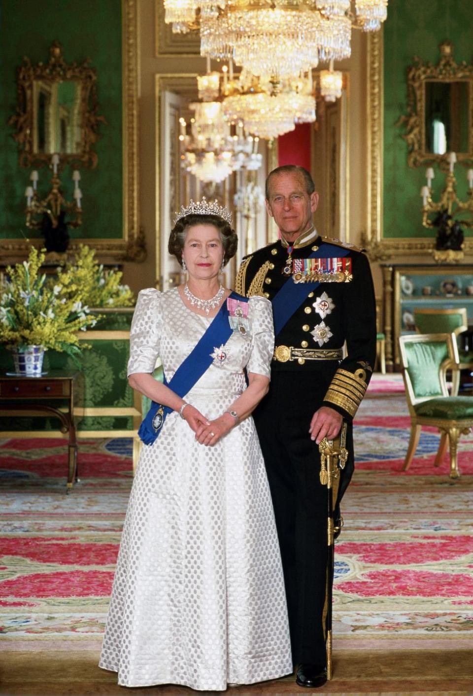 <p>In this portrait taken to celebrate her 40th wedding anniversary to Prince Philip, Queen Elizabeth chose a white dress with a dot pattern. She accessorized with a sparkling tiara and elaborate diamond necklace as well. </p>