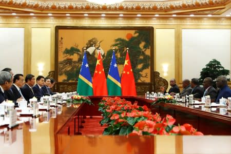 Solomon Islands Prime Minister Manasseh Sogavare attends a meeting with Chinese Premier Li Keqiang at the Great Hall of the People in Beijing