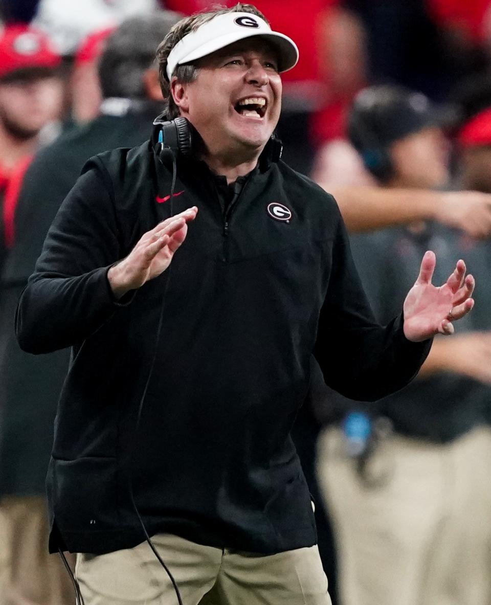 Jan 10, 2022; Indianapolis, IN, USA; Georgia Bulldog head coach Kirby Smart coaches against Alabama during the 2022 CFP college football national championship game at Lucas Oil Stadium. Mandatory Credit: Gary Cosby Jr.-USA TODAY Sports