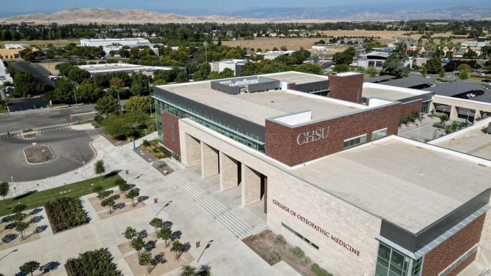 The California Health Sciences University College of Osteopathic Medicine building in Clovis’ Research and Technology Park is at center while other buildings and empty lots that could be used for potential housing stand in the distance in the drone image made on Wednesday, Sept. 27, 2023.