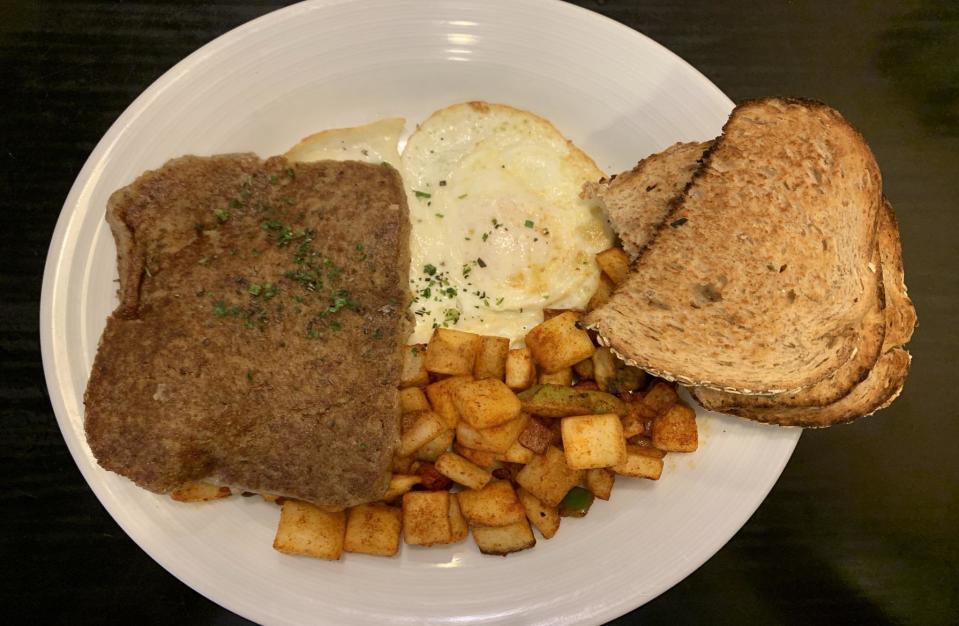 <p>In the Mid-Atlantic states including Pennsylvania, Maryland, and Delaware, a traditional food of the Pennsylvania Dutch is easy to track down: scrapple. This diner staple is made by combining pork scraps and trimmings with cornmeal and seasonings, blending it into mush, forming it into a loaf, letting it congeal, then slicing and pan-frying before serving. If you find it at a store near you, this is definitely a <a href="https://www.thedailymeal.com/cook/regional-breakfast-foods?referrer=yahoo&category=beauty_food&include_utm=1&utm_medium=referral&utm_source=yahoo&utm_campaign=feed" rel="nofollow noopener" target="_blank" data-ylk="slk:regional breakfast food worth trying;elm:context_link;itc:0;sec:content-canvas" class="link ">regional breakfast food worth trying</a>.</p>