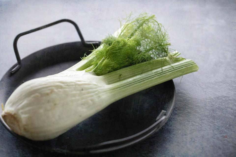 Fennel with its rotund bulb, green stalks and frilly, dill-like fronds.