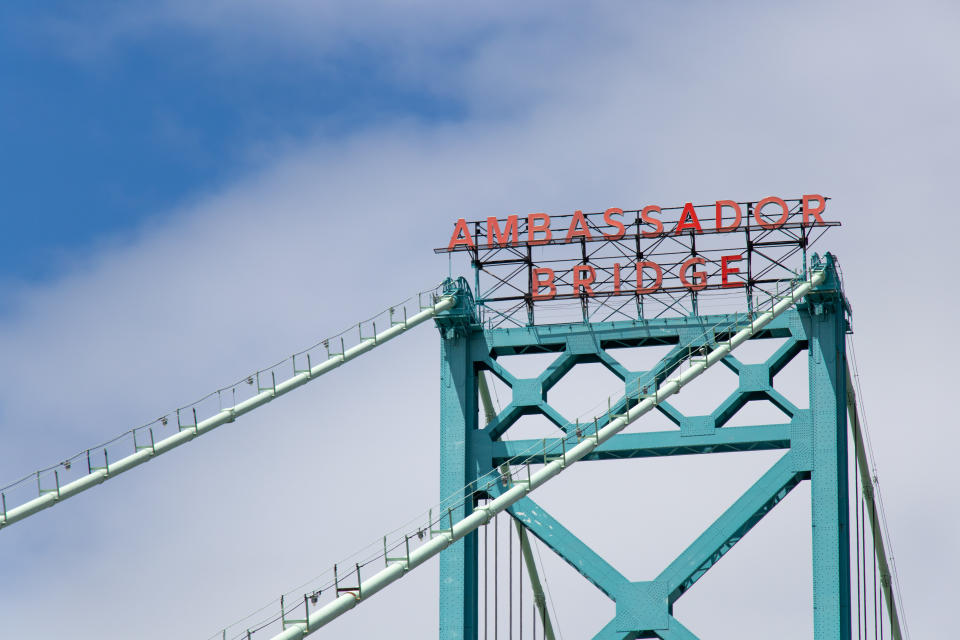 Sign atop the Ambassador Bridge, US-Canada border crossing between Detroit and Windsor.