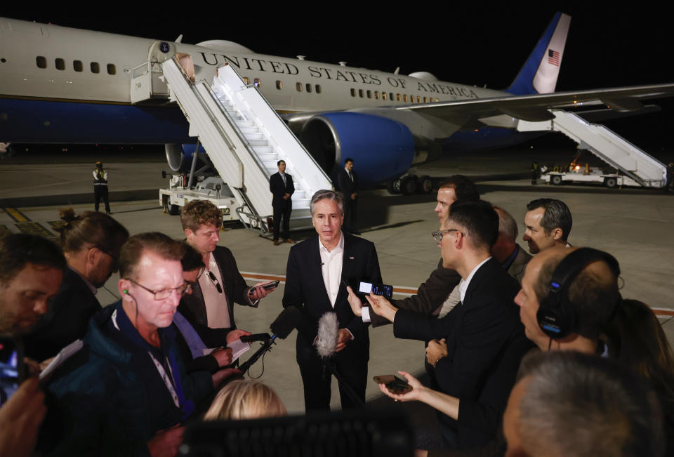 U.S. Secretary of State Antony Blinken speaks to the media, during his week-long trip aimed at calming tensions across the Middle East, at the airport in Al Ula, Saudi Arabia, Monday, Jan. 8, 2024. (Evelyn Hockstein/Pool Photo via AP)