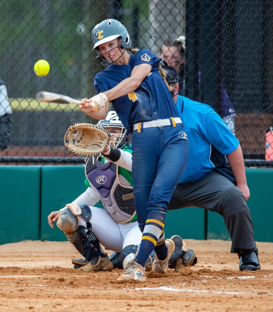 Commodore Emily Greek makes contact. Gulf Coast State College and Pensacola State faced off in softball at Frank Brown Park Saturday, March 19, 2022.