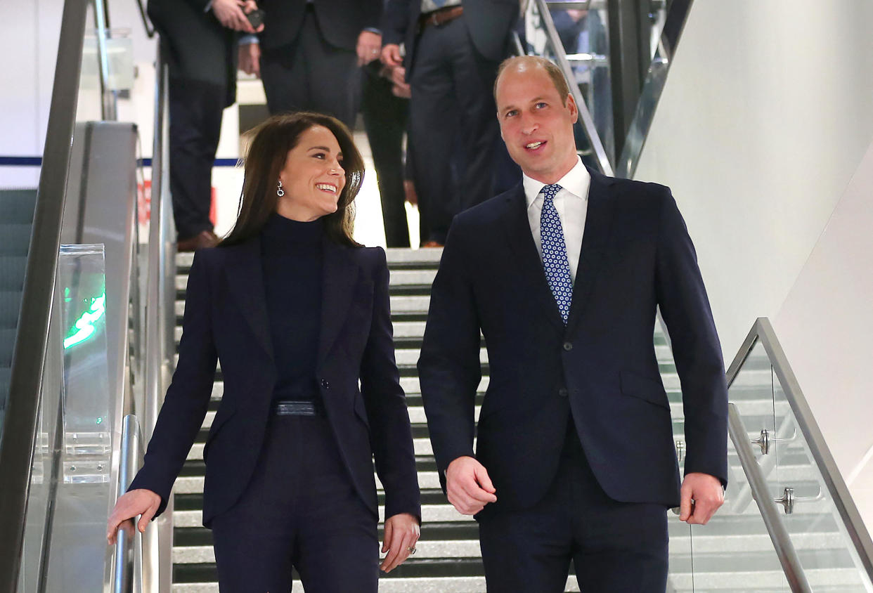 Britain's Prince William, Prince of Wales, and Catherine, Princess of Wales, arrive at Boston Logan International Airport on November 30, 2022. / Credit: JOHN TLUMACKI/POOL/AFP via Getty Images