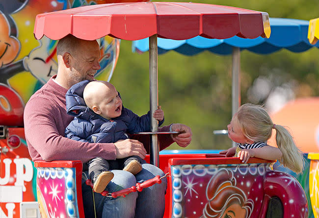 Mike Tindall and son Lucas on fair ride