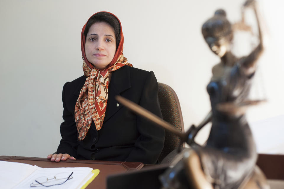 FILE - In this Nov. 1, 2008 file photo, Iranian human rights lawyer Nasrin Sotoudeh, poses for a photograph in her office in Tehran, Iran. The imprisoned Iranian human rights lawyer Nasrin Sotoudeh and the prominent Belarus opposition figure Ales Bialiatski have been awarded the 2020 Swedish Right Livelihood Award, sometimes referred to as the “Alternative Nobel,” along with activists from Nicaragua and the United States. (AP Photo/Arash Ashourinia, File)