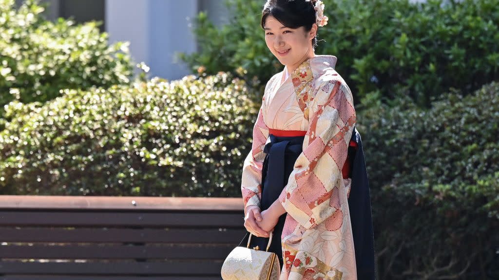 japans princess aiko, the daughter of emperor naruhito and empress masako, walks through the grounds of gakushuin university on her way to attend her graduation ceremony, in the mejiro area of tokyo on march 20, 2024 photo by richard a brooks pool afp photo by richard a brookspoolafp via getty images