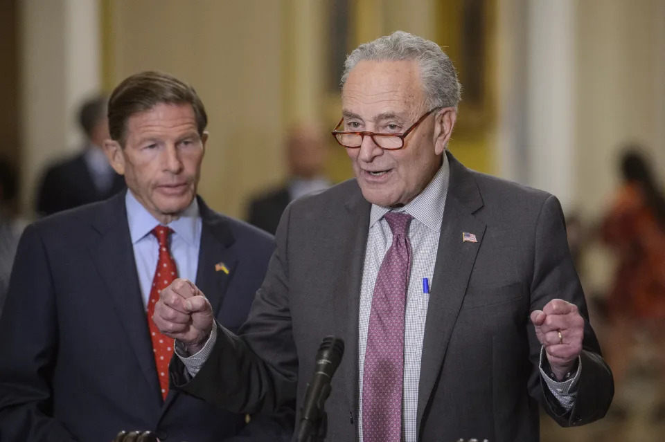 Sen. Richard Blumenthal, D-Conn., left, listens as Senate Majority Leader Chuck Schumer, D-N.Y., offers remarks following the Senate Democrats policy luncheon at the U.S. Capitol Tuesday, July 30, 2024, in Washington. (AP Photo/Rod Lamkey, Jr.)