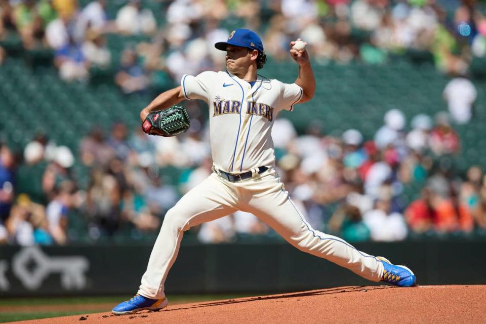 Seattle Mariners starting pitcher Marco Gonzales works against the Los Angeles Angels during the first inning of a baseball game, Sunday, Aug. 7, 2022, in Seattle. (AP Photo/John Froschauer)