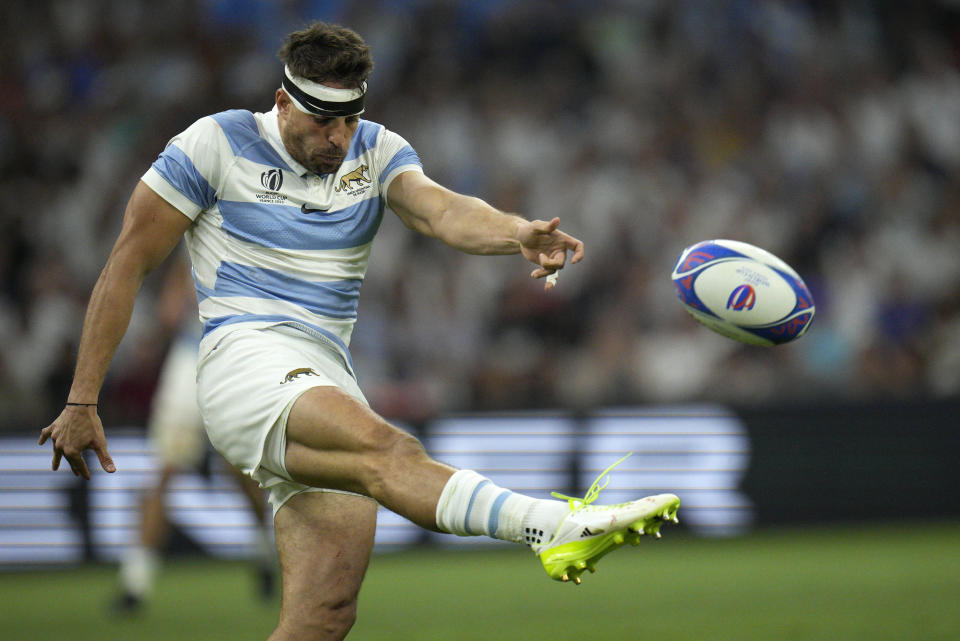 Argentina's Juan Cruz Mallia clears the ball during the Rugby World Cup Pool D match between England and Argentina in the Stade de Marseille, Marseille, France Saturday, Sept. 9, 2023. (AP Photo/Daniel Cole)