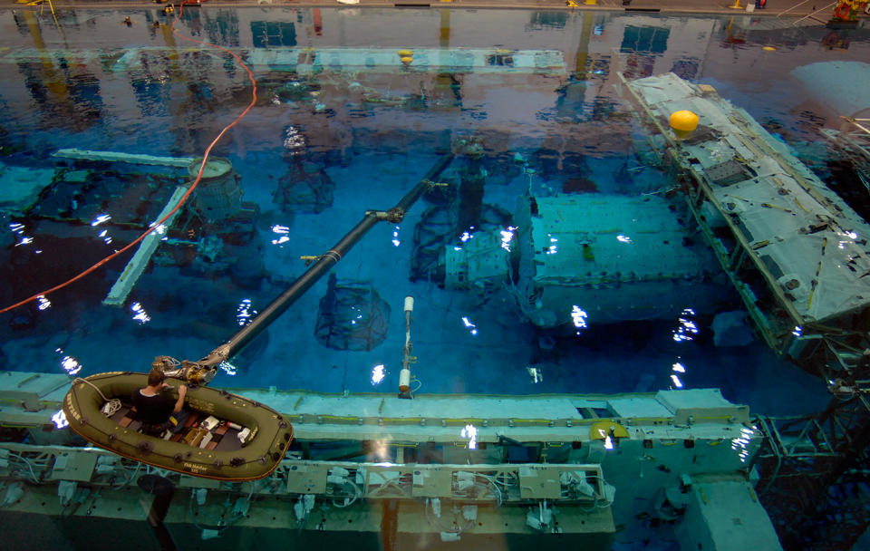 At the JSC Sonny Carter Training Facility's Neutral Buoyancy Lab, astronauts can suit up and experience a simulated zero-gravity situation while underwater. Here they have a full-size mockup of the ISS in one of the world's largest indoor pools containing 6.2 million gallons of water.

