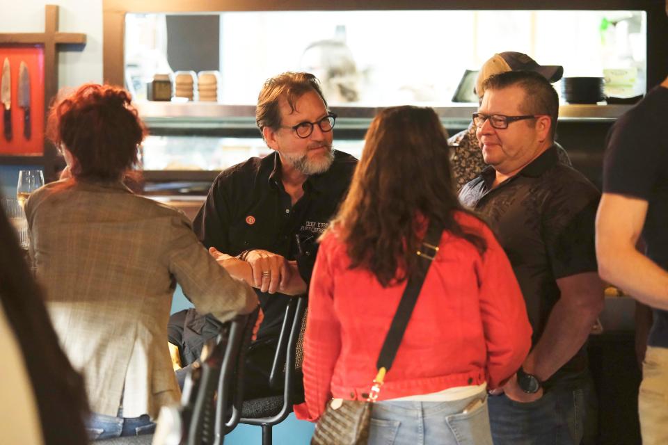 Chef Kurt Fleischfresser speaks with former Coach House apprentices at The Crown Room on April 26.