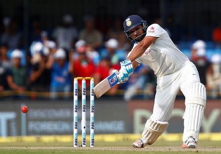 Cricket - India v New Zealand - Third Test cricket match - Holkar Cricket Stadium, Indore, India - 09/10/2016. India's Rohit Sharma plays a shot. REUTERS/Danish Siddiqui