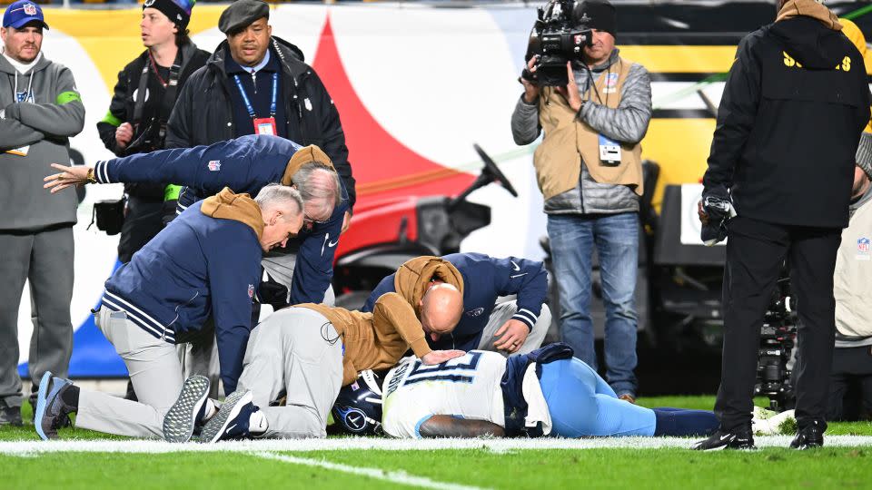 Burks is checked on by medical staff in the fourth quarter against the Steelers. - Joe Sargent/Getty Images