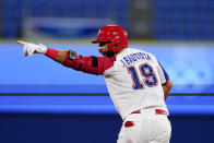 Dominican Republic's Jose Bautista reacts after hitting the game winning RBI single during the ninth inning of a baseball game against Israel at the 2020 Summer Olympics, Tuesday, Aug. 3, 2021, in Yokohama, Japan. The Dominican Republic won 7-6. (AP Photo/Matt Slocum)