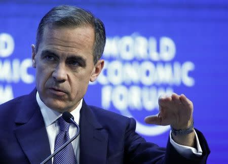 Mark Carney, Governor of the Bank of England, gestures during the session 'The Global Economic Outlook' in the Swiss mountain resort of Davos January 24, 2015. REUTERS/Ruben Sprich