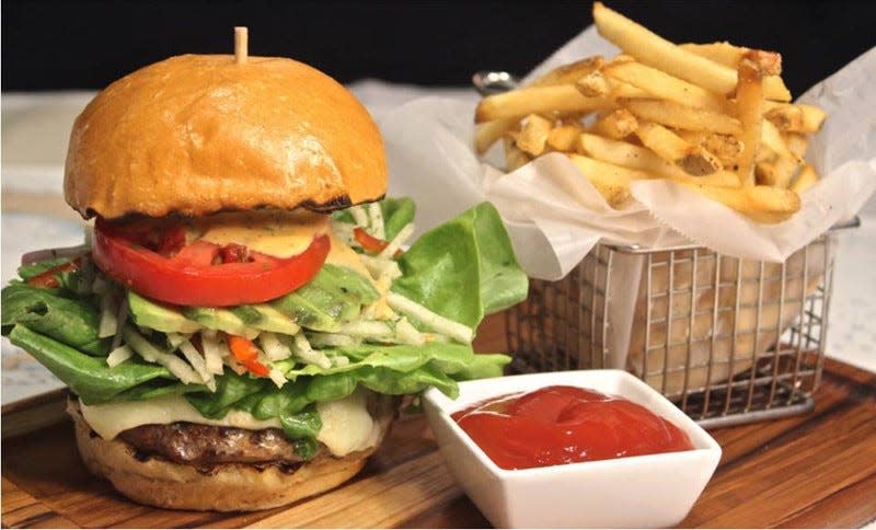 A signature cheeseburger at Table 26 in West Palm Beach.