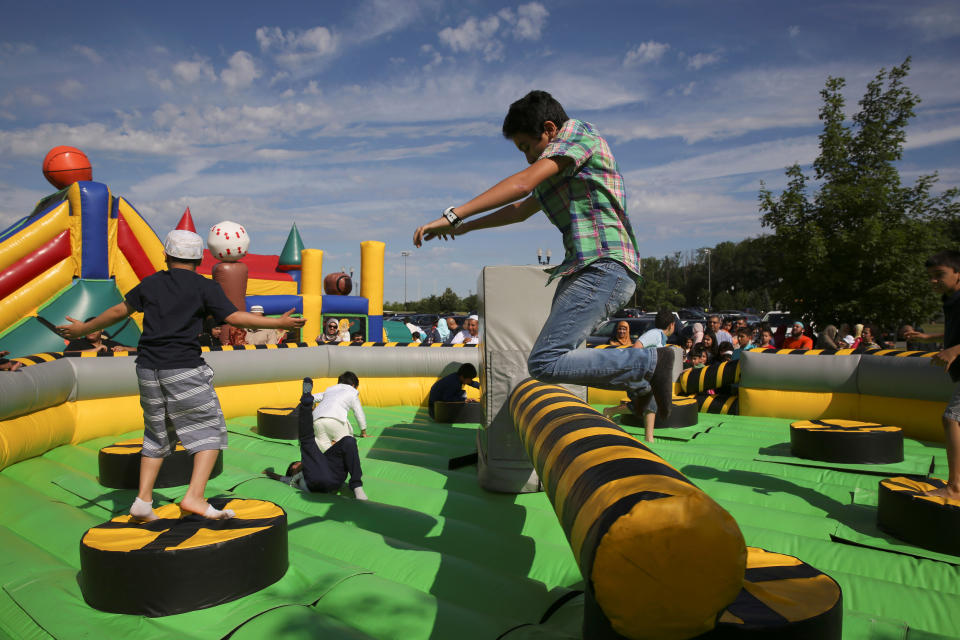 Muslim children play in celebration of Eid al-Fitr at a park in South Brunswick Township, New Jersey, U.S., on June 25, 2017.&nbsp;