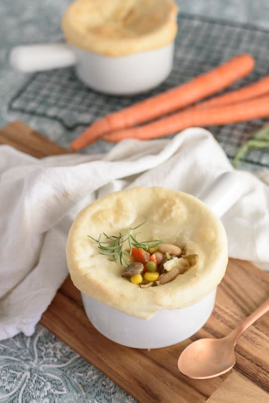 <p>These vegan pot pies would make the cutest Christmas centrepieces. Loaded with fresh veggies in a creamy sauce and topped with a layer of perfectly flaky pie crust, yum! </p><p>Get the <a href="https://www.deliciouseveryday.com/vegan-pot-pies/" rel="nofollow noopener" target="_blank" data-ylk="slk:Vegan Pot Pie;elm:context_link;itc:0;sec:content-canvas" class="link ">Vegan Pot Pie</a> recipe. </p><p>Recipe from <a href="https://www.deliciouseveryday.com/" rel="nofollow noopener" target="_blank" data-ylk="slk:Delicious Everyday;elm:context_link;itc:0;sec:content-canvas" class="link ">Delicious Everyday</a>.</p>