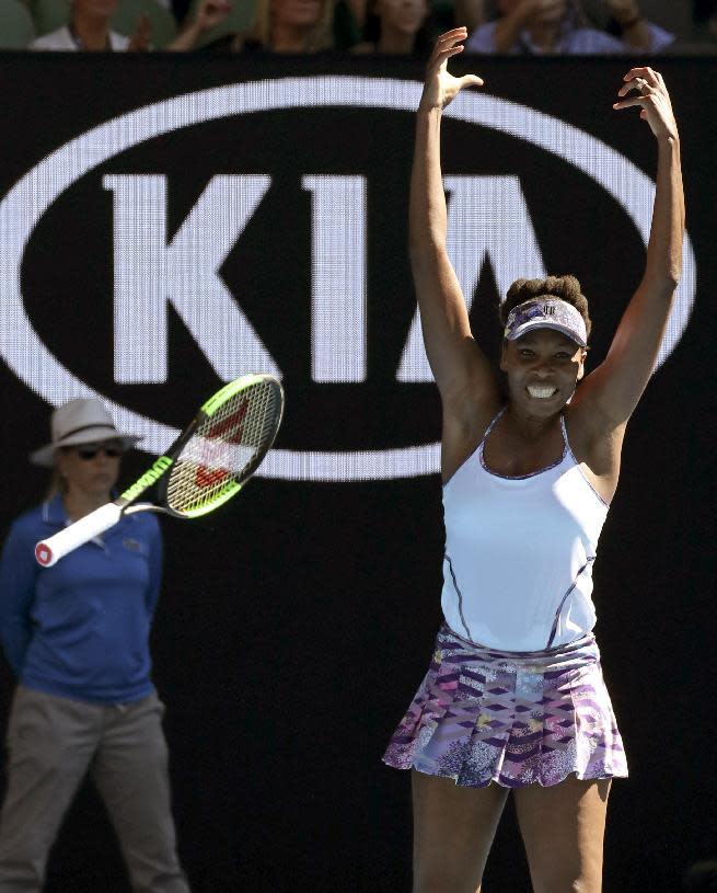 United States' Venus Williams celebrates after defeating compatriot Coco Vandeweghe during their semifinal at the Australian Open tennis championships in Melbourne, Australia, Thursday, Jan. 26, 2017. (AP Photo/Aaron Favila)